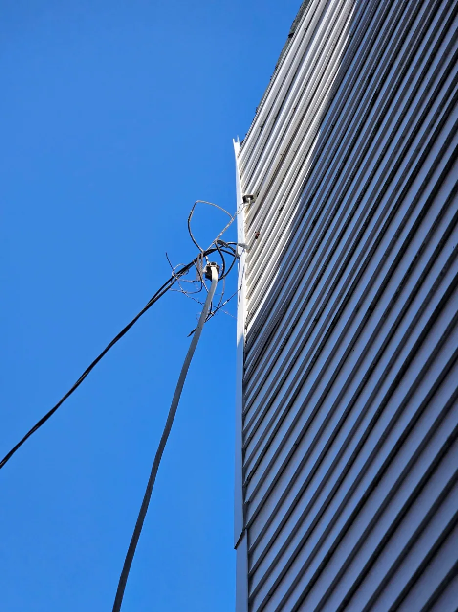 Loose house-mounted service entrance cable, Baltimore City